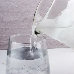 Catalina Cane Wrapped Serving Pitcher - 68 Ounce 8 Catalina Cane Wrapped Serving Pitcher - 68 Ounce -Endurance Sales Catalina Cane Wrapped Serving Pitcher scene2