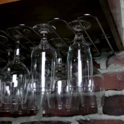 BarConic® 12 Oz Footed Beer Cocktail Glass - Case Of 12 -Endurance Sales footed beer glasses on rack