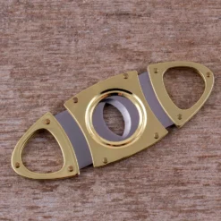 Double Blade Guillotine Cigar Cutter - Gold Plated 8 Double Blade Guillotine Cigar Cutter - Gold Plated -Endurance Sales gold cigar cutter scene1