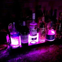 LED Counter Caddies™ - Slate Straight Shelf - Liquor/Wine Bottle Display - 24" Length W/ T-Molding 20 LED Counter Caddies™ - Slate Straight Shelf - Liquor/Wine Bottle Display - 24" Length W/ T-Molding -Endurance Sales led counter caddy black t molding pink light